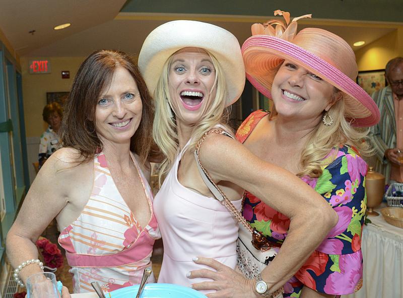 Dana Meadows, Karen Sposato and Karen Falk whoop it up at the BBQ.